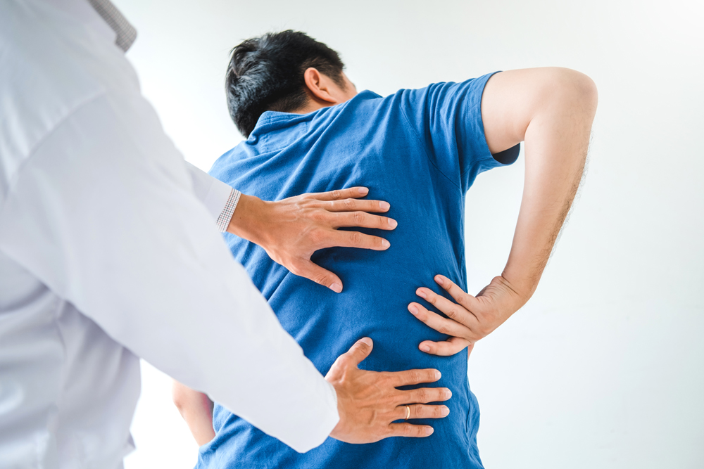 Chiropractor consulting with patient About  muscule pain problems Physical therapy diagnosing concept